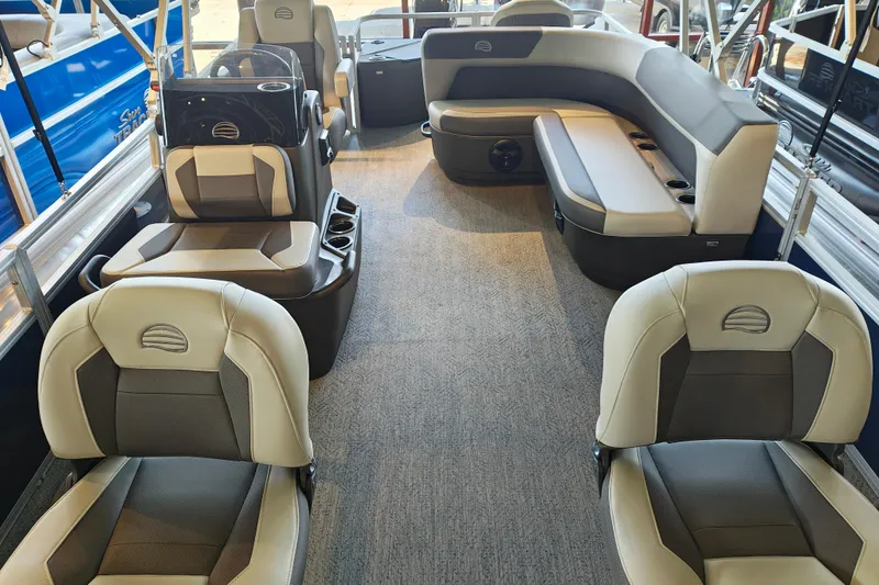 Slide: The Image of 2026 Sun Tracker Bass Buggy 18 DLX interior with comfortable seating and modern design. - 4