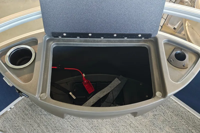 Slide: The Image of Open storage compartment on 2026 Sun Tracker Bass Buggy 18 DLX boat. - 23