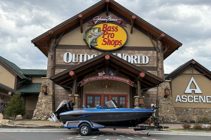 The Image of 2026 Ranger 1880MS boat displayed outside Bass Pro Shops Outdoor World. - 0