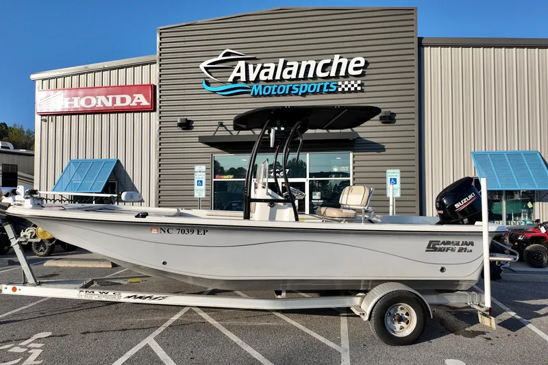 The Image of 2020 Carolina Skiff 21 LS boat on trailer at Avalanche Motorsports dealership. - 1