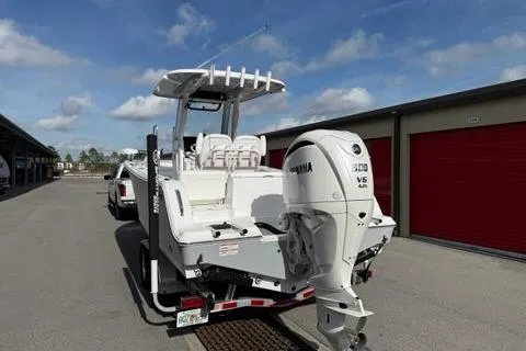 Slide: The Image of 2024 Sportsman Heritage 231 Center Console boat with Yamaha 300 V6 engine on trailer. - 11