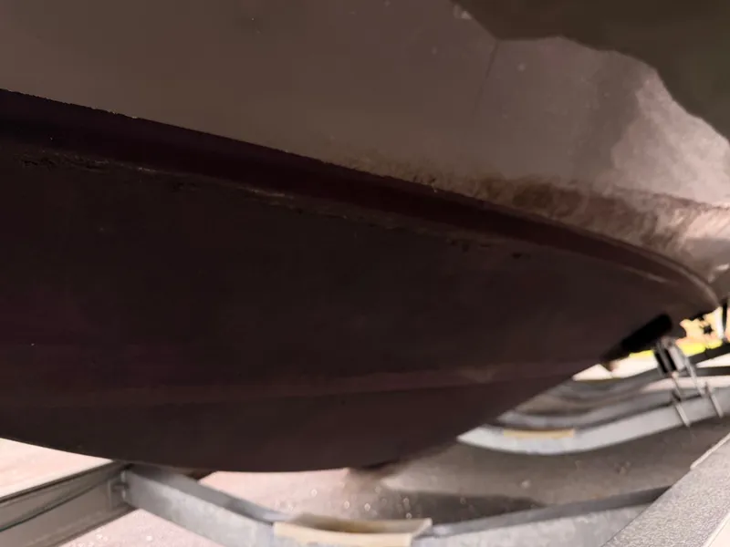 The Image of Underside of a 2013 Regal 24 FasDeck boat on a trailer. - 0