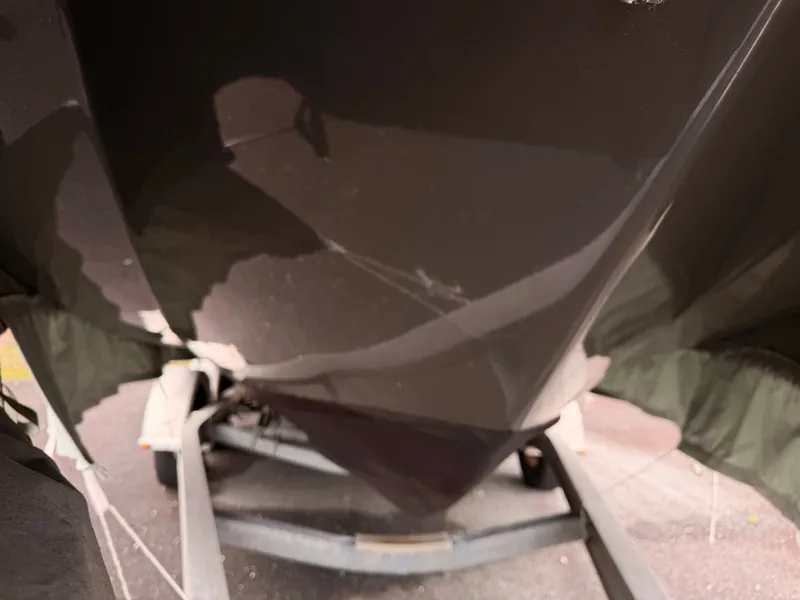 Slide: The Image of Regal 24 FasDeck 2013 on trailer, close-up of hull. - 2