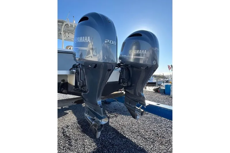 Slide: The Image of Twin Yamaha 200 outboard engines on a 2019 Parker 2501 Center Console boat. - 11