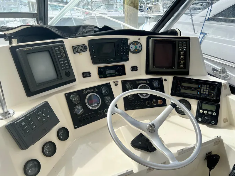 Slide: The Image of 1997 Henriques 38 El Bravo boat helm with instruments. - 6
