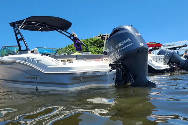 Slide: The Image of 2020 Chaparral 21 SSi OB boat with Yamaha outboard engine on calm water. - 10