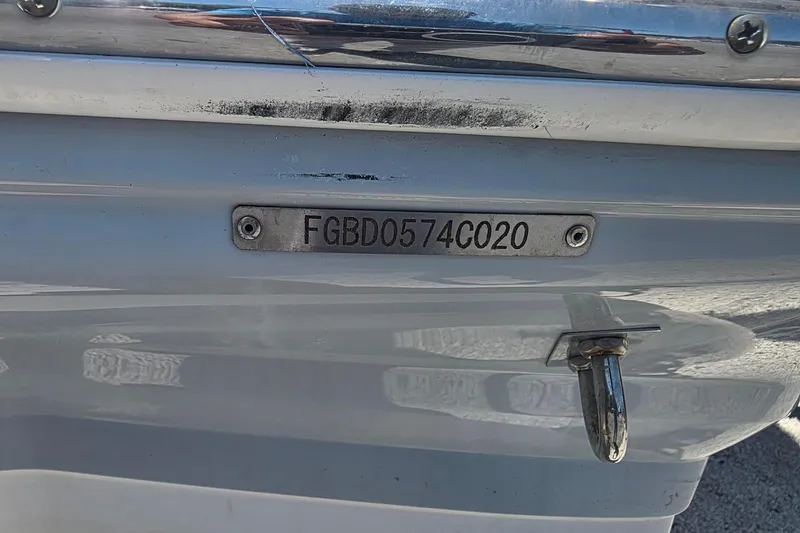 Slide: The Image of 2020 Chaparral 21 SSi OB boat with visible hull identification number. - 24