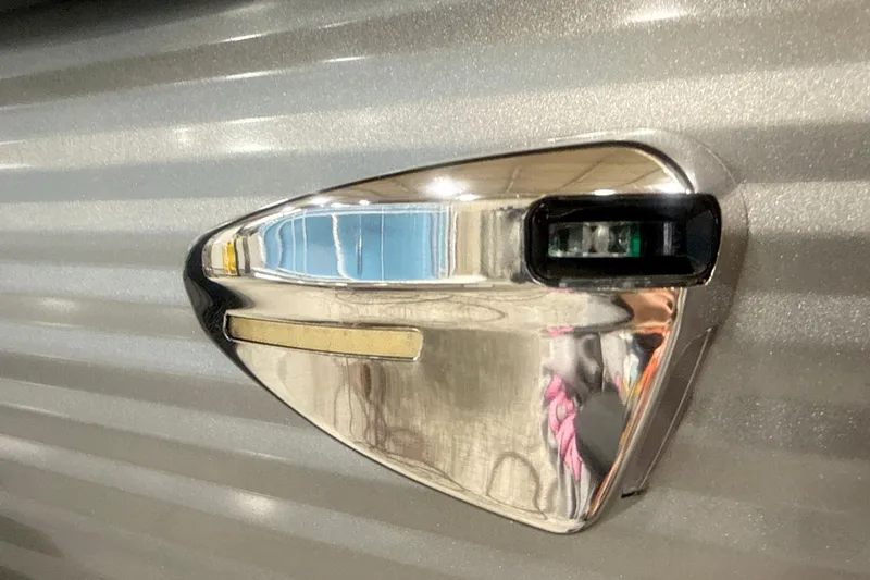 Slide: The Image of Close-up of 2026 Bennington 22 S Quad Bench boat detail with metallic finish. - 12