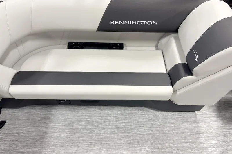 Slide: The Image of 2026 Bennington 22 S Quad Bench with sleek gray and white upholstery. - 4