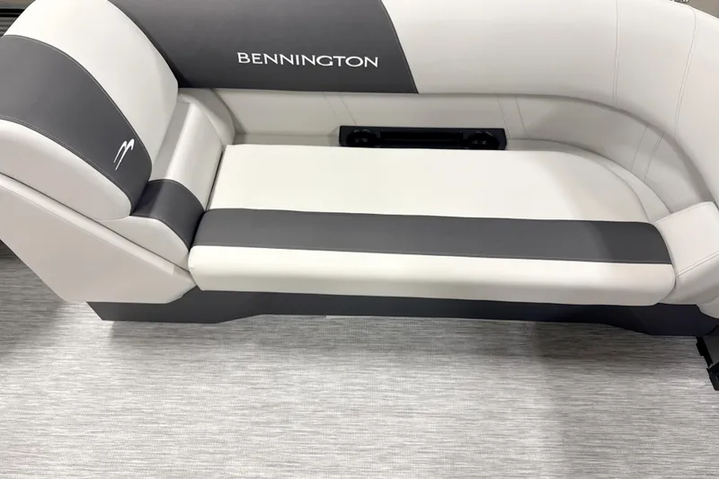 Slide: The Image of 2026 Bennington 22 S Quad Bench boat seat, featuring sleek gray and white upholstery. - 5