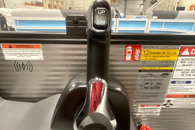 Slide: The Image of Throttle control and capacity warnings on a 2026 Bennington 22 S Quad Bench boat. - 7