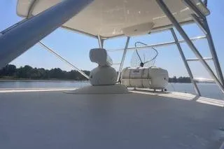 Slide: The Image of 2008 Albemarle 360 Express Fisherman boat deck with clear sky and water view. - 11