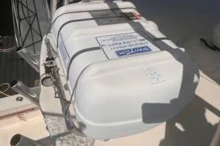 Slide: The Image of 2008 Albemarle 360 Express Fisherman boat with a secured white safety container on deck. - 14