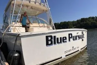 Slide: The Image of 2008 Albemarle 360 Express Fisherman boat named "Blue Pursuit" docked at Dover Point. - 16