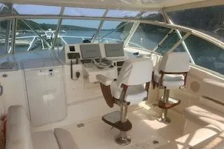 Slide: The Image of 2008 Albemarle 360 Express Fisherman cockpit with dual seats and navigation equipment. - 21