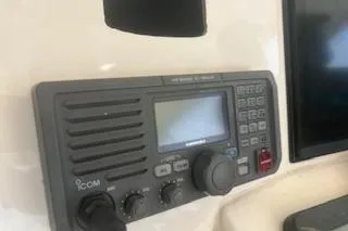 Slide: The Image of ICOM marine radio on 2008 Albemarle 360 Express Fisherman boat dashboard. - 24