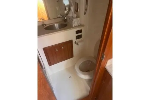 Slide: The Image of 2008 Albemarle 360 Express Fisherman boat bathroom with sink and toilet. - 29