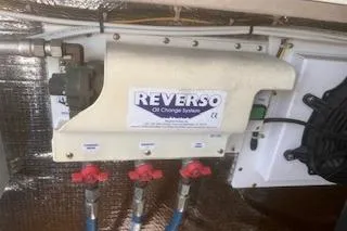 Slide: The Image of Reverso oil change system in 2008 Albemarle 360 Express Fisherman boat. - 33