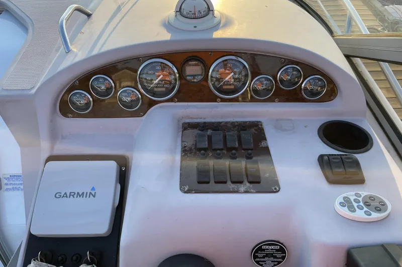 Slide: The Image of Control panel of a 2001 Regal Commodore 2660 boat with Garmin navigation system. - 6