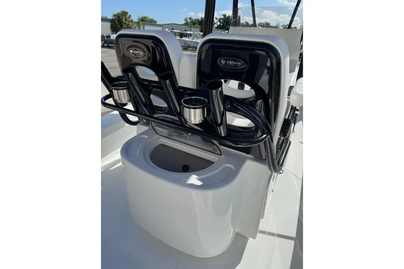 Slide: The Image of 2026 BlackJack 256 Coastal boat interior with cushioned seating and storage compartments. - 19