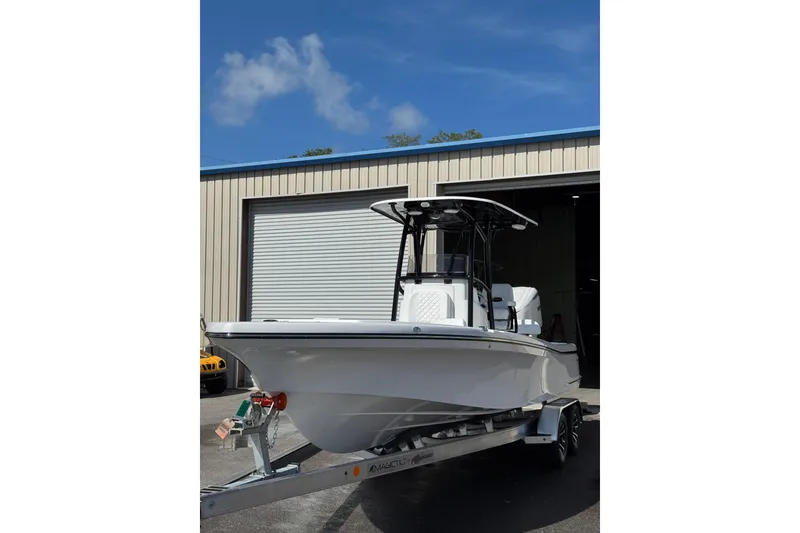 Slide: The Image of 2026 BlackJack 256 Coastal boat with sleek black T-top and modern seating. - 4