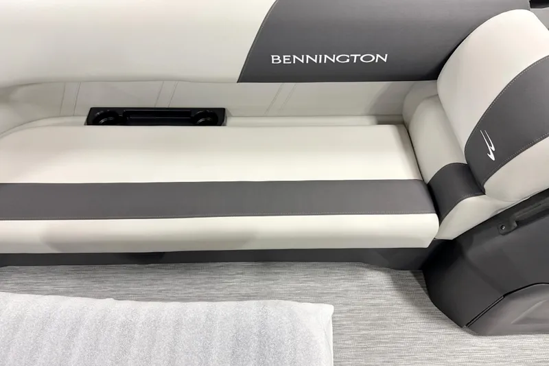 Slide: The Image of 2026 Bennington 22 S Swingback boat seat with gray and white upholstery. - 10