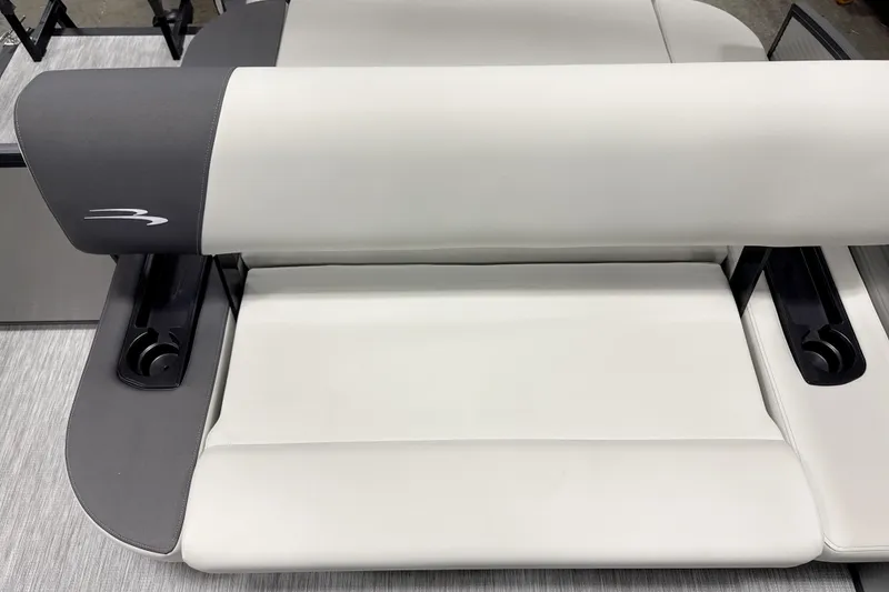 Slide: The Image of 2026 Bennington 22 S Swingback boat seat with cup holders, featuring sleek gray and white design. - 11
