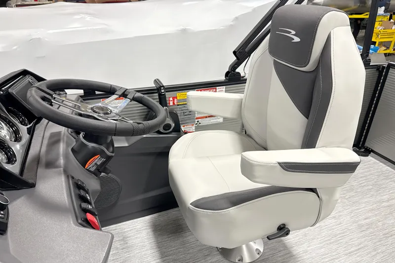 Slide: The Image of Captain's chair and steering wheel of 2026 Bennington 22 S Swingback boat. - 14
