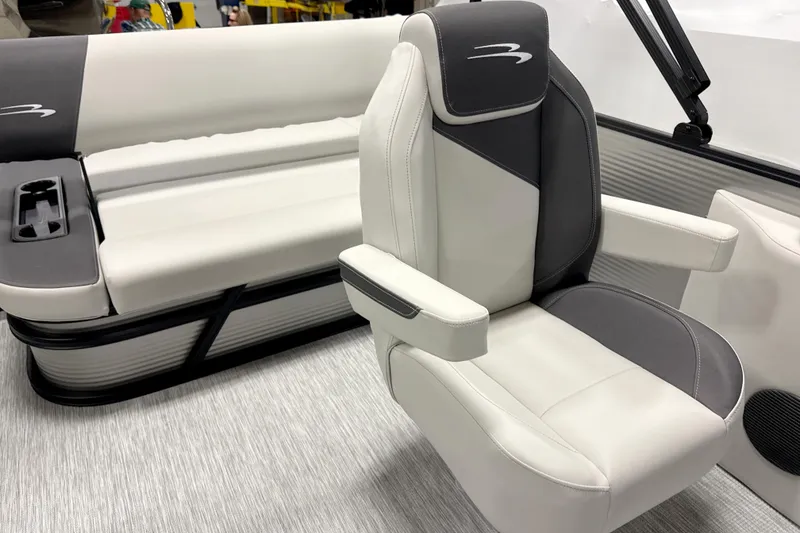 Slide: The Image of 2026 Bennington 22 S Swingback boat interior with plush seating and modern design. - 15