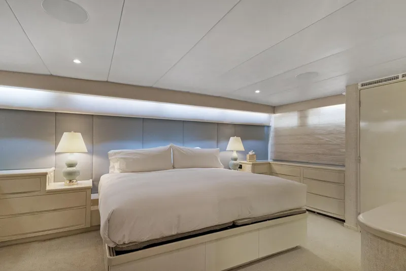 Slide: The Image of Luxurious yacht bedroom with modern decor, soft lighting, and elegant furnishings, 1985 Burger model. - 12
