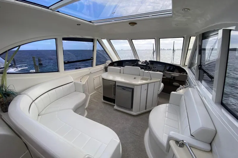 Slide: The Image of Luxurious interior of 2000 Carver 506 Motor Yacht with panoramic ocean views. - 12