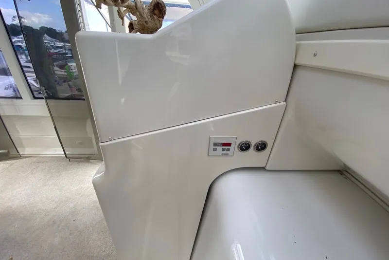 Slide: The Image of Interior view of a 2000 Carver 506 Motor Yacht, featuring control panel and sleek design. - 14