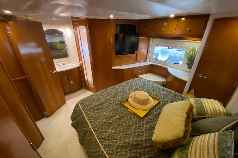 Slide: The Image of Luxurious interior of 2000 Carver 506 Motor Yacht with elegant wood finishes. - 34