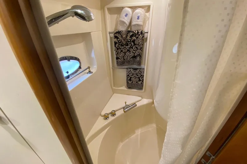 Slide: The Image of Luxurious bathroom in 2000 Carver 506 Motor Yacht with elegant fixtures and decor. - 38
