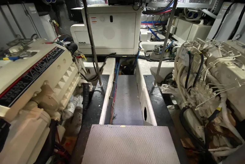 Slide: The Image of Engine room of 2000 Carver 506 Motor Yacht with visible machinery and equipment. - 41