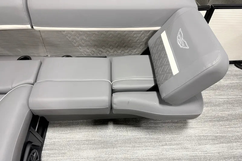 Slide: The Image of 2026 Bennington 23 M Swingback boat seat with gray upholstery and diamond pattern. - 10