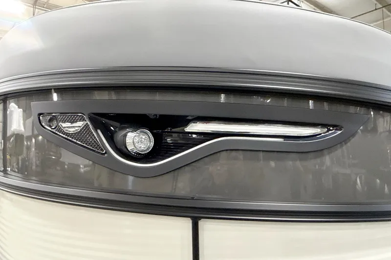 Slide: The Image of Close-up of 2026 Bennington 23 M Swingback boat's sleek front design and lighting. - 16