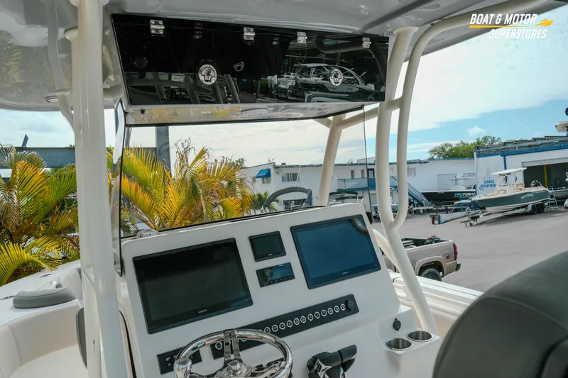 Slide: The Image of Interior view of 2026 Key West 291 FS boat dashboard with modern controls. - 14