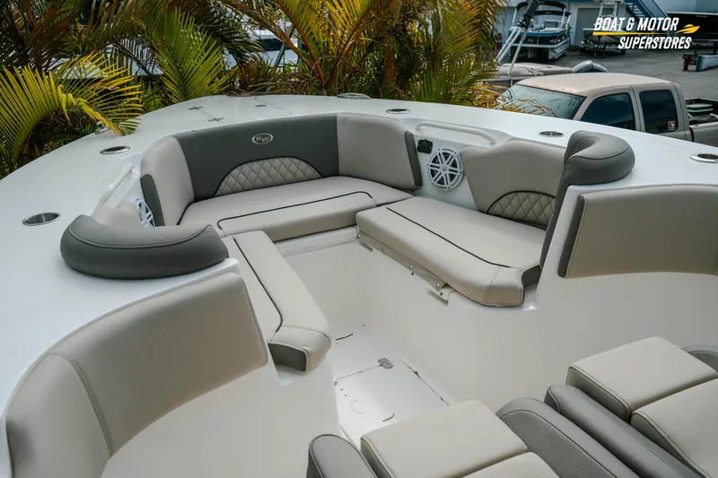 Slide: The Image of Luxurious seating area on 2026 Key West 291 FS boat, featuring plush cushions and sleek design. - 23