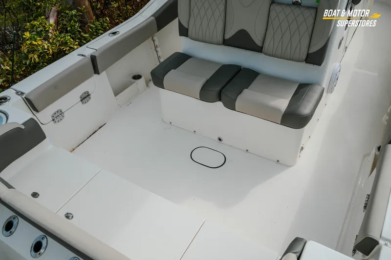 Slide: The Image of Interior view of 2026 Key West 291 FS boat with cushioned seating. - 8