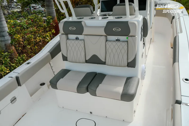 Slide: The Image of 2026 Key West 291 FS boat interior with cushioned seating and sleek design. - 9