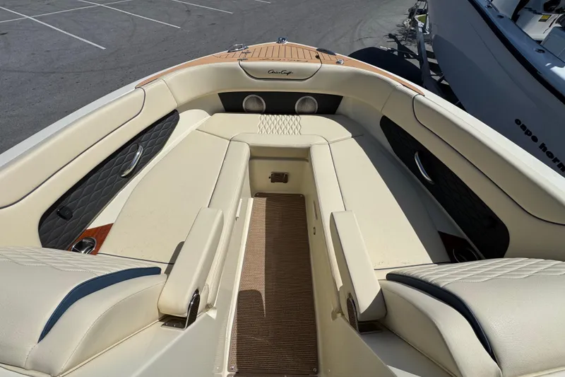 Slide: The Image of Luxurious interior of 2026 Chris-Craft Sportster 28 boat with elegant seating. - 19