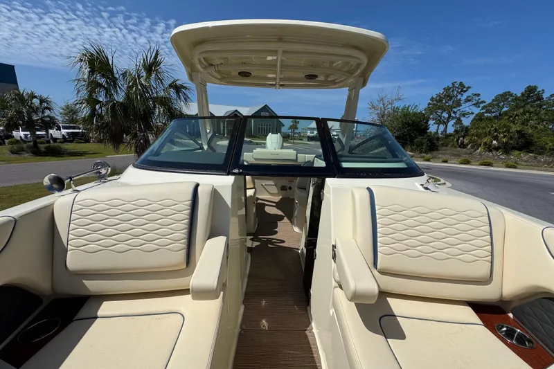 Slide: The Image of 2026 Chris-Craft Sportster 28 boat interior with luxurious seating and sleek design. - 22