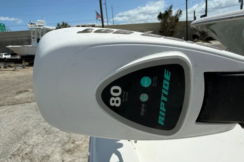 Slide: The Image of Close-up of a Riptide motor on a 2010 Sea Hunt XP 19 boat. - 5