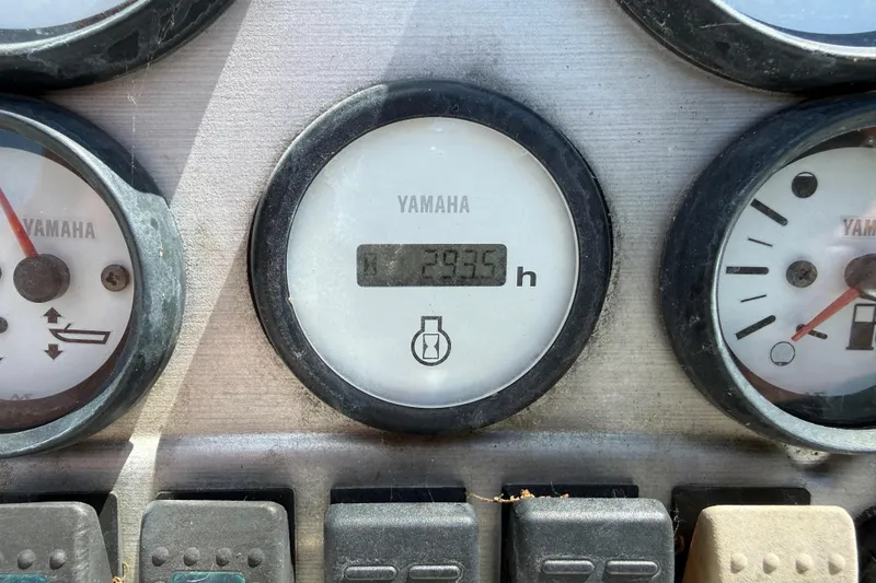 Slide: The Image of Close-up of Yamaha boat gauges on a 2010 Sea Hunt XP 19. - 9