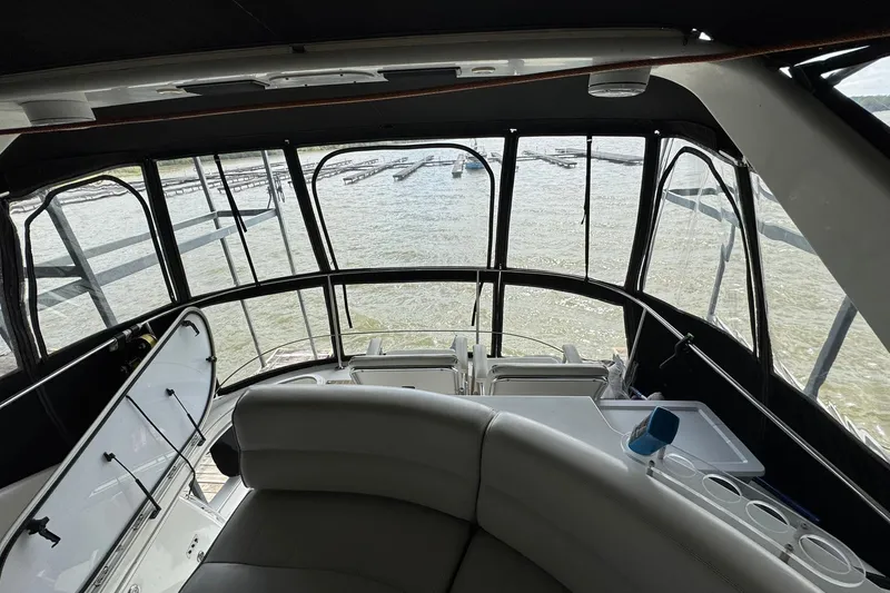 Slide: The Image of Interior view of 1999 Carver 450 Voyager Pilothouse overlooking water. - 21