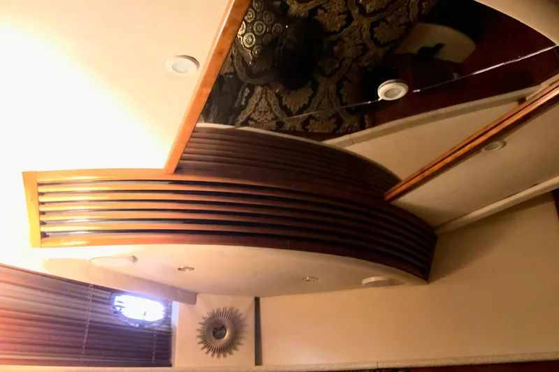 Slide: The Image of Interior of 1999 Carver 450 Voyager Pilothouse with elegant wood and ceiling design. - 43