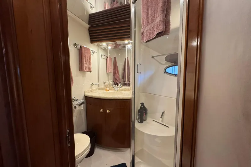 Slide: The Image of Bathroom interior of 1999 Carver 450 Voyager Pilothouse yacht with shower and vanity. - 44