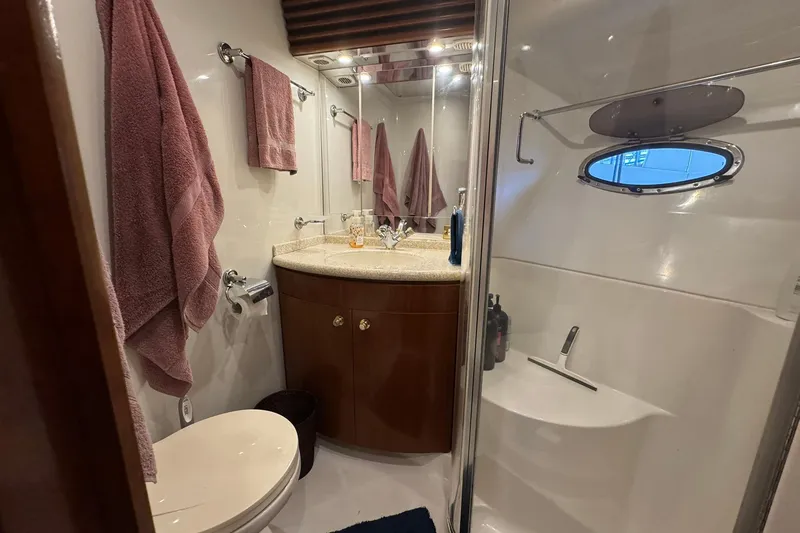 Slide: The Image of Bathroom interior of 1999 Carver 450 Voyager Pilothouse with shower and vanity. - 45
