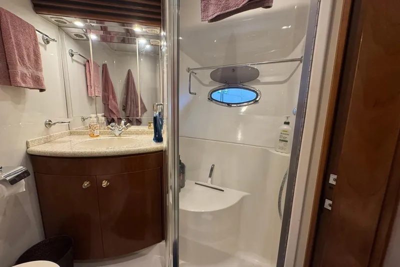 Slide: The Image of Bathroom interior of 1999 Carver 450 Voyager Pilothouse yacht with shower and vanity. - 46